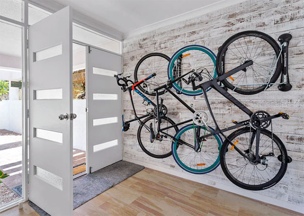 elegant home entryway with steadyrack bike racks holding bikes