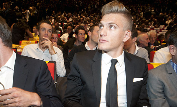 pro cyclist marcel kittel suited up in black suit